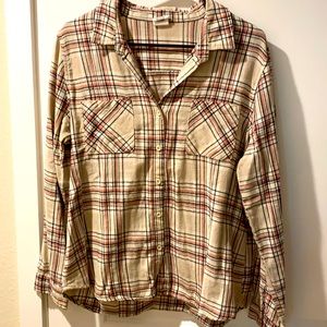 Tan colored flannel with pink and black plaid
